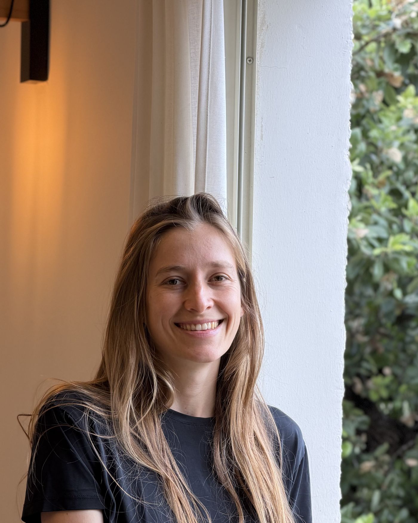 Yael, the founder, smiling