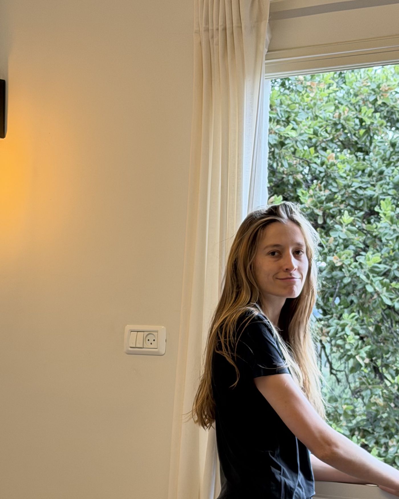 Yael by the window
